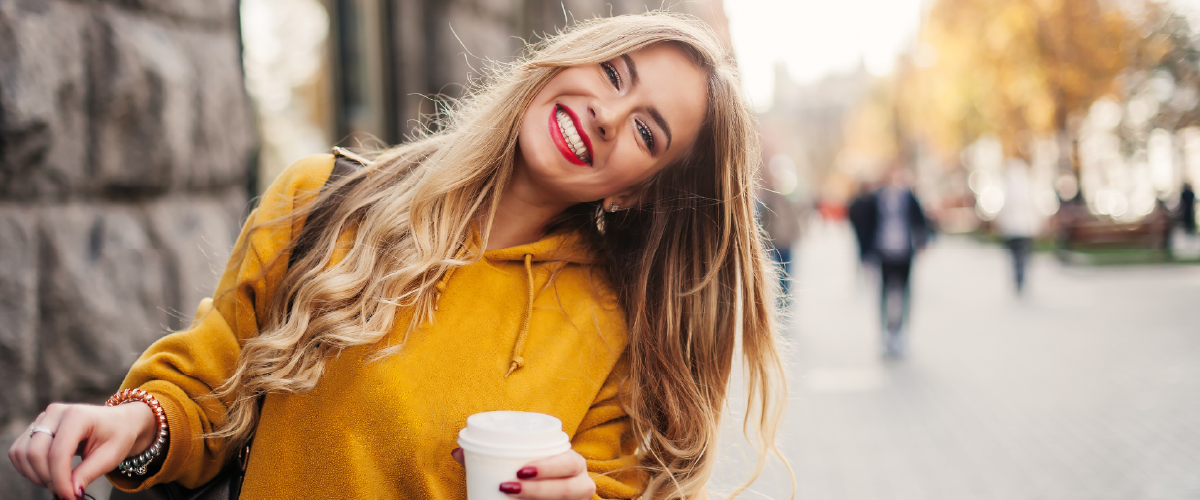 Woman holding coffee